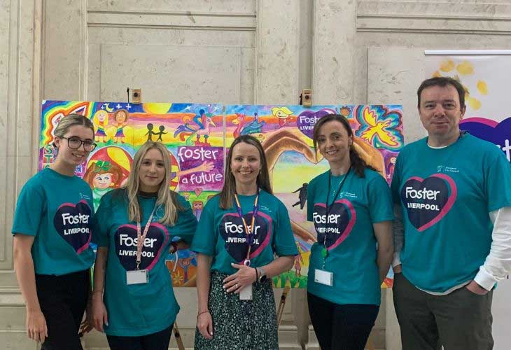 Liverpool Fostering Team standing in a line inside Cunard Building, Liverpool