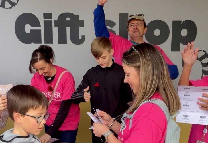 Members of Liverpool Foster Team promoting fostering in gift shop